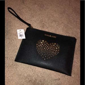 Black Michael Kors XL zip clutch, leather.